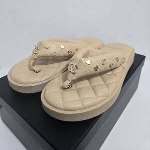 Chanel 23P Beige Quilted Charms Padded Pool Thong Mule Sandals, (Size 38) w Box